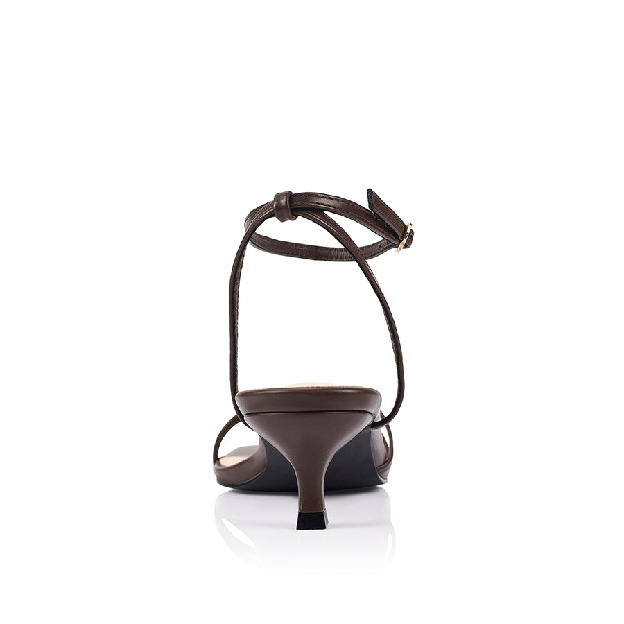 Brown square toe sandal with a kitten heel and an adjustable strap