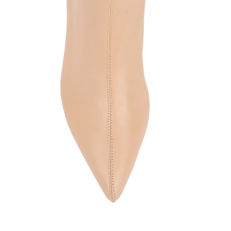 Womens beige ankle sock boot with stiletto heel and pointed toe