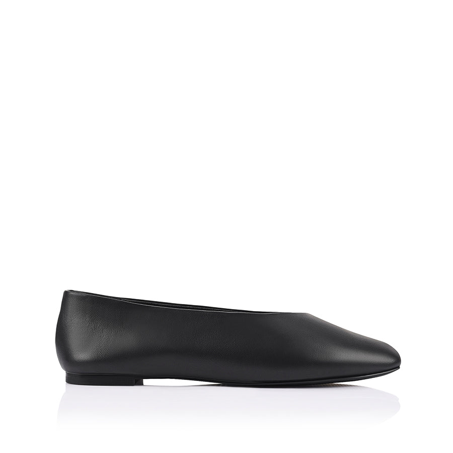 Black flat shoe with a square toe shape