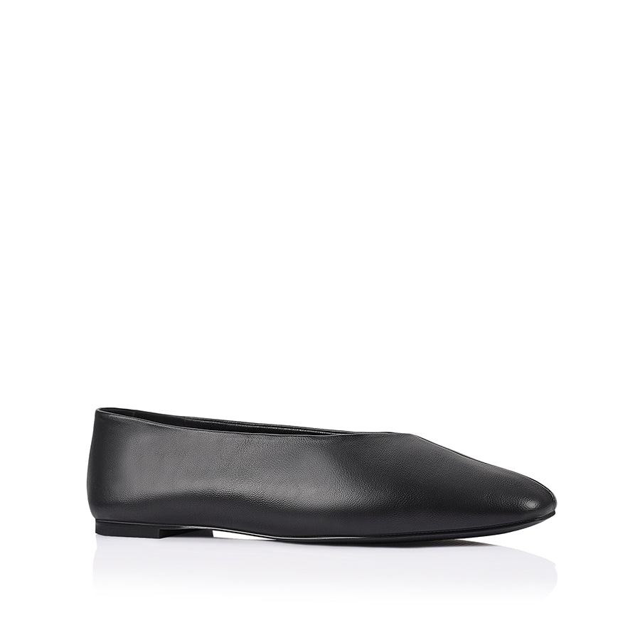 Black flat shoe with a square toe shape