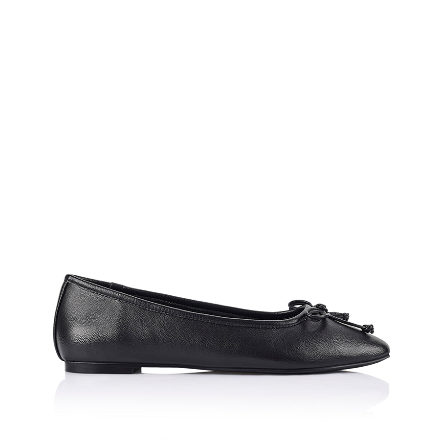 Black smooth ballet flats with a black heel and small bow