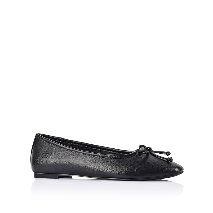 Black smooth ballet flats with a black heel and small bow