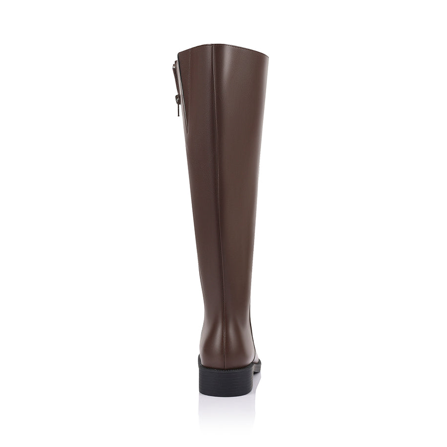 Brown knee high boot with a wide calf shaft