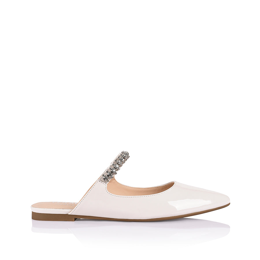 Women's white patent flat mules with crystal embellishment