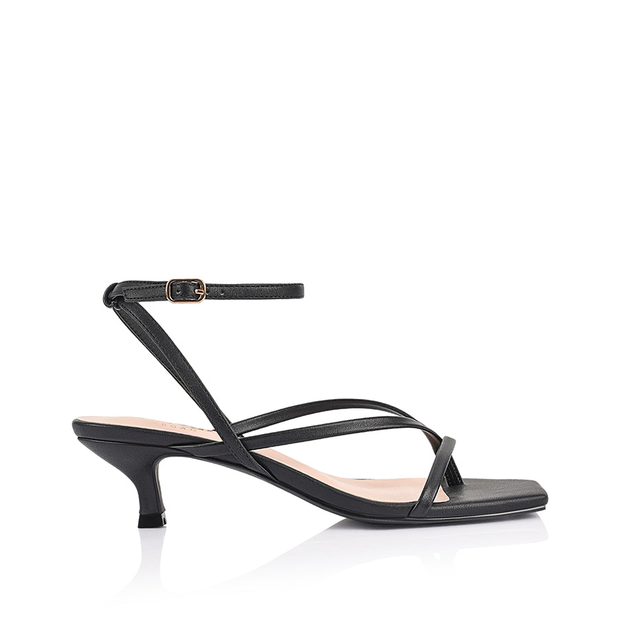 Women's low kitten heel, strappy thong style with adjustable ankle strap in smooth black
