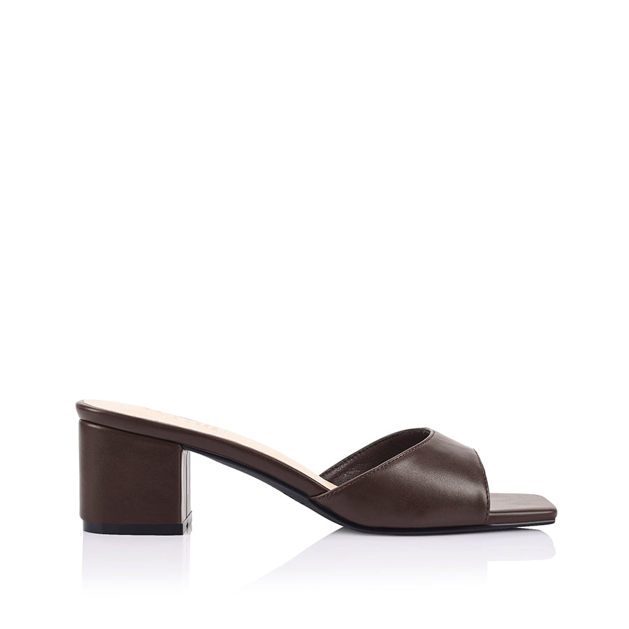 Chocolate block heel mule with a square toe shape