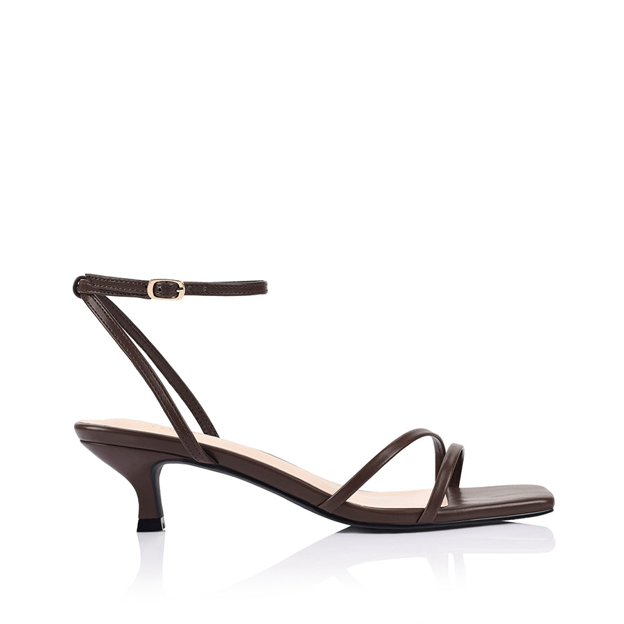 Brown square toe sandal with a kitten heel and an adjustable strap
