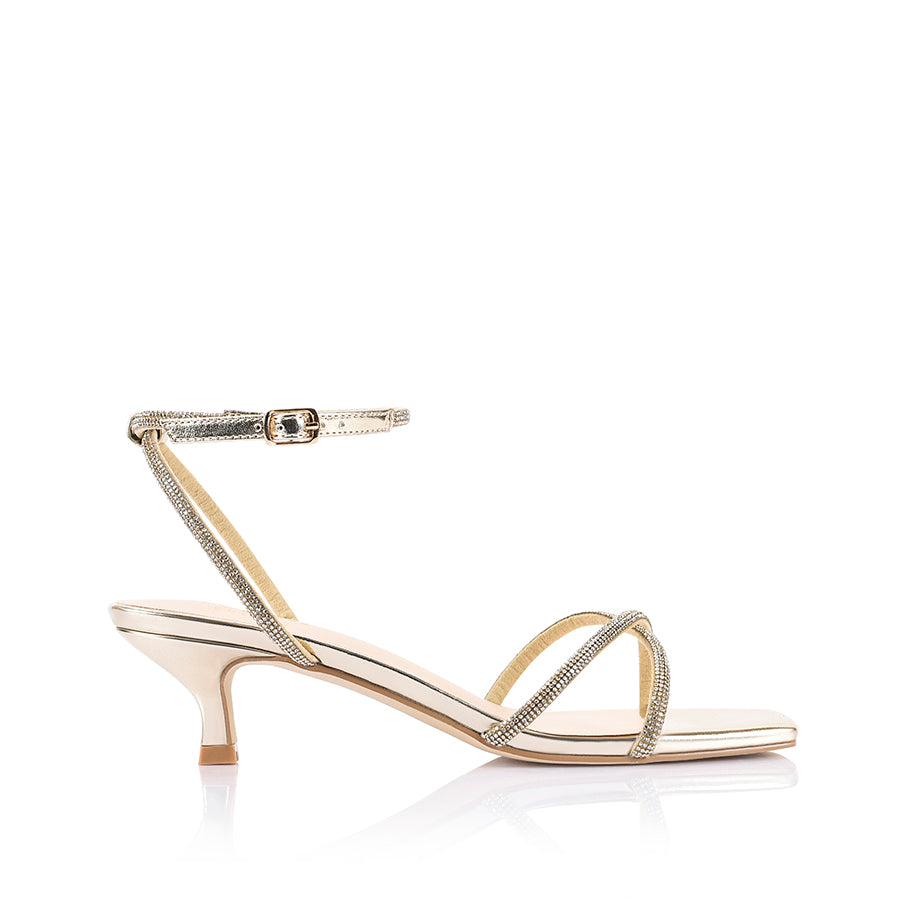 Gold high-heeled sandal with thin straps 