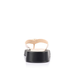 Women's black and bone white platform thong with gold heart embellishment 