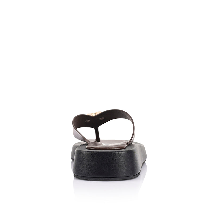 Women's black and chocolate brown platform thong with gold heart embellishment 