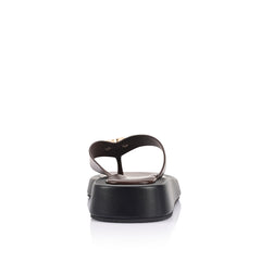 Women's black and chocolate brown platform thong with gold heart embellishment 