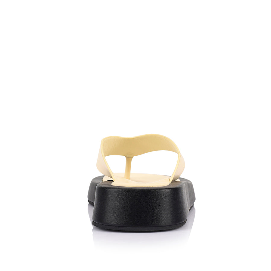 Women's butter soft yellow and black vegan platform thongs