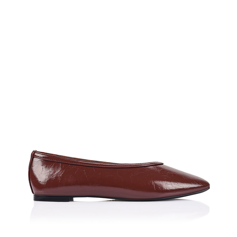 Burgundy flat with square toe shape and v high vamp