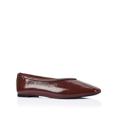 Burgundy flat with square toe shape and v high vamp