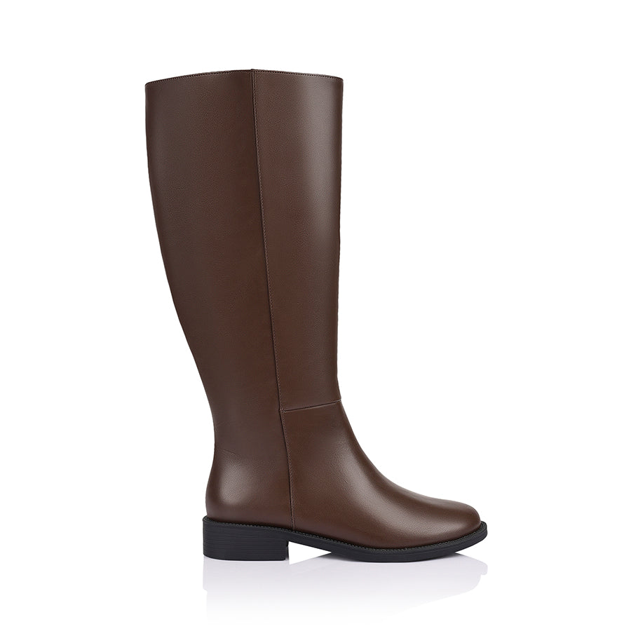 Brown knee high boot with a wide calf shaft