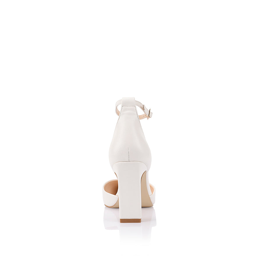 Women's white smooth pointed toe block heel with cupped sole and adjustable ankle strap