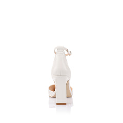 Women's white smooth pointed toe block heel with cupped sole and adjustable ankle strap