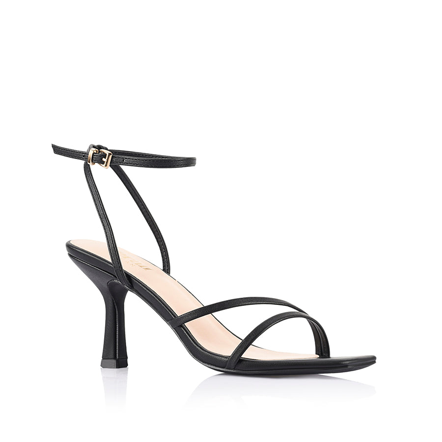 Black high-heeled sandal with thin straps that fasten with a gold buckle