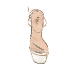 Gold high-heeled sandal with thin straps that fasten with a gold buckle