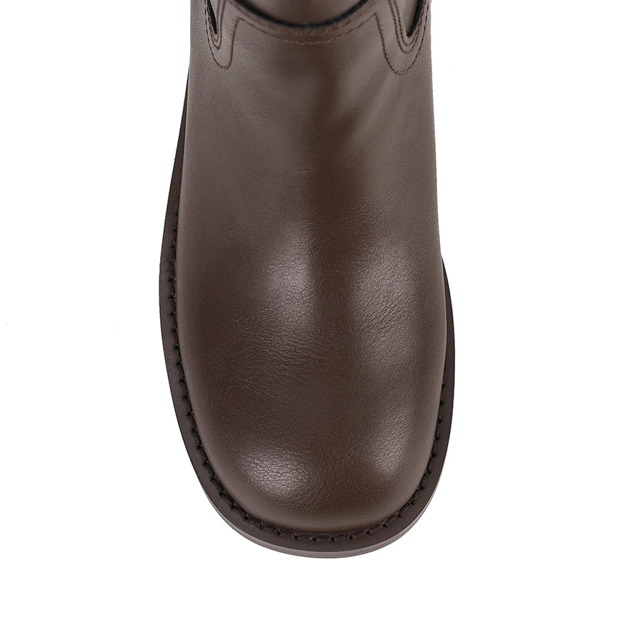 Brown knee-high boot with a rounded toe shape