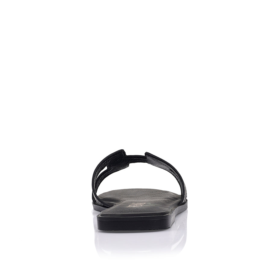 Women's flat sandal in black vegan leather for summer