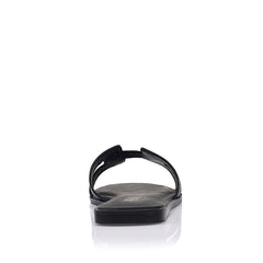 Women's flat sandal in black vegan leather for summer