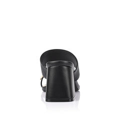 Women's black vegan block heel mule with wide strap upper and gold toe ring detail