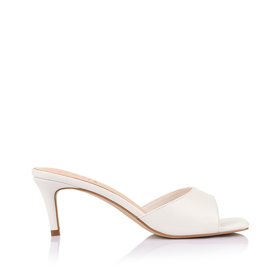 Women's slip on mule in vegan white materials with square toe